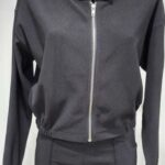 Black zip-up jacket with ribbed cuffs and buttoned collar detail.
