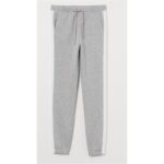 A pair of grey jogger pants with white side stripes and an adjustable waistband.